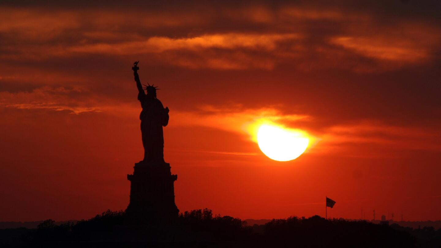 NY state, feds agree to reopen Statue of Liberty AP News