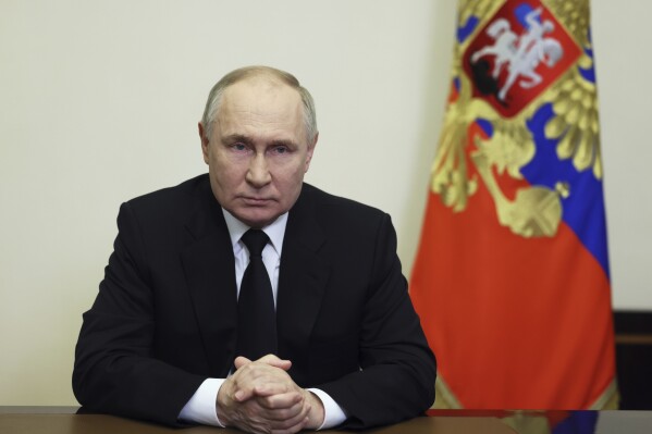 Russian President Vladimir Putin addressees the nation in Moscow, Russia, March 23, 2024. A little-known U.S. intelligence principle called the "duty to warn" came into play ahead of the deadly attack on Moscow's outskirts. U.S. officials invoked that duty when warning Russian officials a full two weeks before the attack on Friday, March 22. Just three days before the attack, Putin dismissed such Western warnings as provocations. (Mikhail Metzel, Sputnik, Kremlin Pool Photo via AP)
