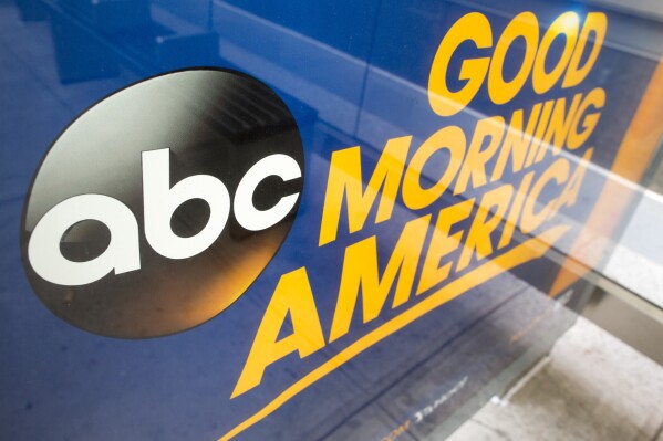 FILE - The ABC logo is seen in an advertisement at a bus stop near their television studio on the West Side of Manhattan, Wednesday, May 10, 2017, in New York. Kim Godwin is out as ABC News president after three years as the first Black woman to lead a television network news division. Godwin, the first Black woman to lead a network news division, said Sunday, May 5, 2024, she was retiring from the business. (AP Photo/Mary Altaffer, File)