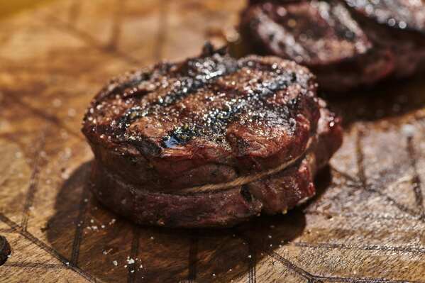 A grilled filet mignon with cross hatch marks in New Milford, Conn. (Cheyenne Cohen via AP)