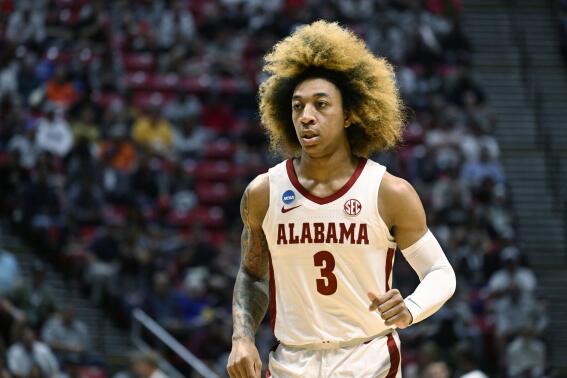 Alabama guard JD Davison (3) runs on the court during the first half of a first-round NCAA college basketball tournament game against Notre Dame, Friday, March 18, 2022, in San Diego. (AP Photo/Denis Poroy)