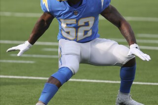 FILE - Los Angeles Chargers middle linebacker Denzel Perryman (52)) defends during an NFL football game against the Denver Broncos, Sunday, Dec. 27, 2020, in Inglewood, Calif. Perryman is back with the Los Angeles Chargers for a second stint with a one-year contract. The team made the announcement on Tuesday, March 19, 2024.(AP Photo/Peter Joneleit, File)