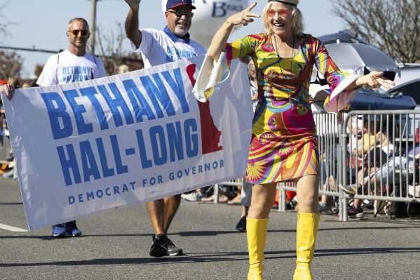 Delaware Lt. Gov. Bethany Hall-Long marches in Rehoboth Beach's 33rd annual Sea Witch Festival Costume Parade, Saturday, Oct. 28, 2023, in Rehoboth Beach, Del. (Jason Minto/The News Journal via AP)