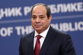 FILE - Egyptian President Abdel Fattah el-Sisi looks on during a press conference after talks with his Serbian counterpart Aleksandar Vucic at the Serbia Palace in Belgrade, Serbia, July 20, 2022.  A group of United Nations-backed experts on Friday, Oct. 7,  criticized the Egyptian government for imposing a wave of restrictions that jeopardize the “safety and full participation” of individuals and organizations wishing to attend the international climate summit in the Arab country next month.  (AP Photo/Darko Vojinovic, File)