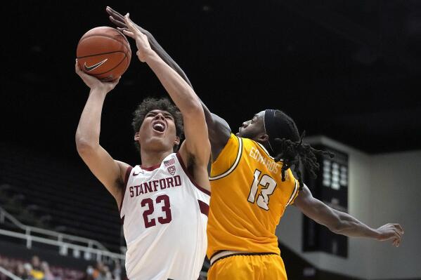 Stanford forward Brandon Angel (23) reacts as he is fouled by Valparaiso guard Sheldon Edwards (13) during the first half of an NCAA college basketball game in Stanford, Calif., Wednesday, Nov. 17, 2021. (AP Photo/Tony Avelar)