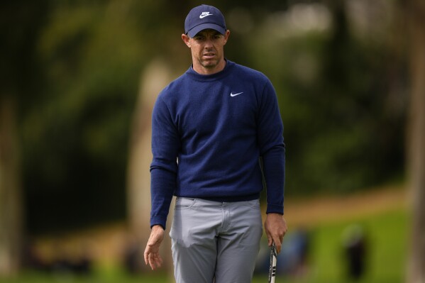 Rory McIlroy, of Northern Ireland, waits to putt on the ninth green during the final round of the Genesis Invitational golf tournament at Riviera Country Club, Sunday, Feb. 18, 2024, in the Pacific Palisades area of, Los Angeles. (AP Photo/Ryan Sun)