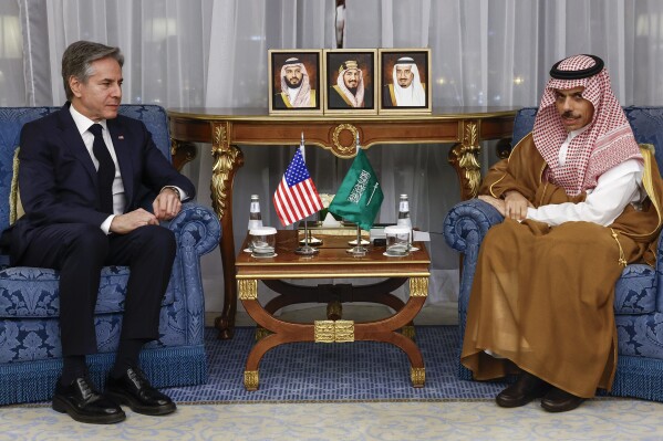 U.S. Secretary of State Antony Blinken meets Saudi Arabia's Foreign Minister Prince Faisal bin Farhan Al-Saud in Jeddah, Saudi Arabia, Wednesday, March 20, 2024. (Evelyn Hockstein/Pool Photo via AP)