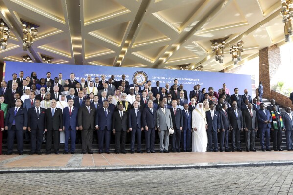 Heads of States and members of the Non-Aligned Movement (NAM), pose for a photo at Speke resort convention centre in Kampala, Uganda Friday, Jan. 19, 2024. The President of the United Nations General Assembly Denis Francis and African Union Commission Chairman Moussa Faki Mahamat have called for an immediate ceasefire in Gaza. (AP Photo/Hajarah Nalwadda)