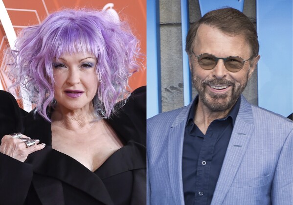 Cyndi Lauper arrives at the 74th annual Tony Awards in New York on Sept. 26, 2021, left, and Bjorn Ulvaeus appears at the premiere of "Mamma Mia! Here We Go Again" in London on July 16, 2018. (AP Photo)