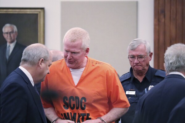 Disbarred attorney Alex Murdaugh arrives in court in Beaufort, S.C. Thursday, Sept. 14, 2023. Murdaugh appeared publicly as a convicted murderer for the first time at the state court hearing regarding the slew of financial crimes allegedly committed by the disbarred South Carolina attorney. (AP Photo/James Pollard)