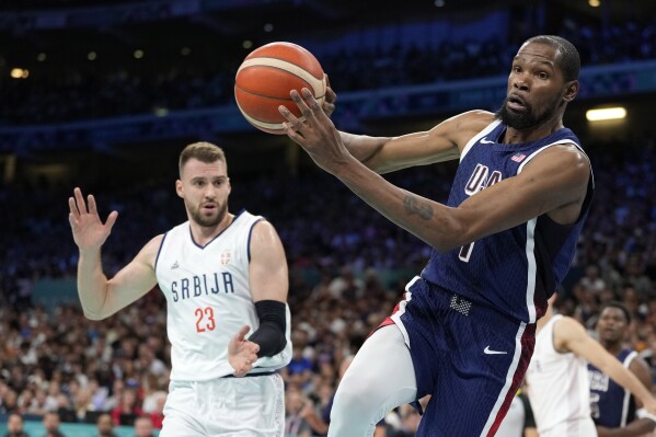 US men's basketball beats Serbia 110-84 in Olympics opening game | AP News