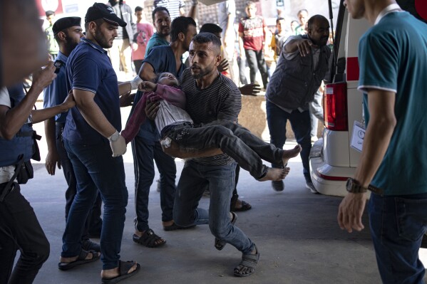 A Palestinian wounded in Israeli bombardment of the Gaza Strip is brought to a hospital in Khan Younis, Monday, Nov. 6, 2023. (AP Photo/Fatima Shbair)