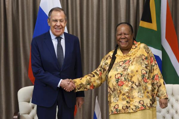 In this photo released by the Russian Foreign Ministry Press Service, Russia's Foreign Minister Sergey Lavrov, left, and his South Africa's counterpart Naledi Pandor pose for a photo prior to their talks in Pretoria, South Africa, Monday, Jan. 23, 2023. (Russian Foreign Ministry Press Service via AP)