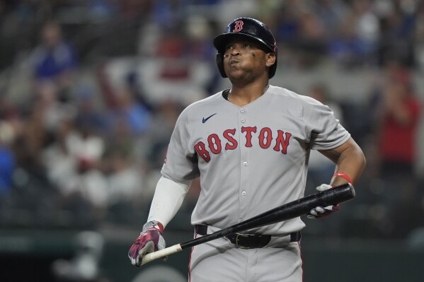Red Sox DH Rafael Devers is 1st big leaguer with 10 strikeouts in 3 games  to open a season | AP News