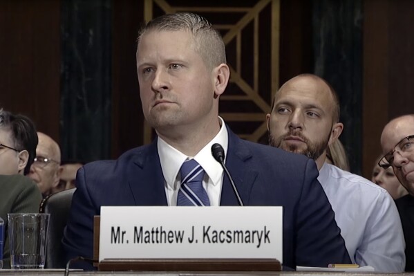 In this image from video from the Senate Judiciary Committee, Matthew Kacsmaryk listens during his confirmation hearing on Capitol Hill in Washington, on Dec. 13, 2017. (Senate Judiciary Committee via AP)