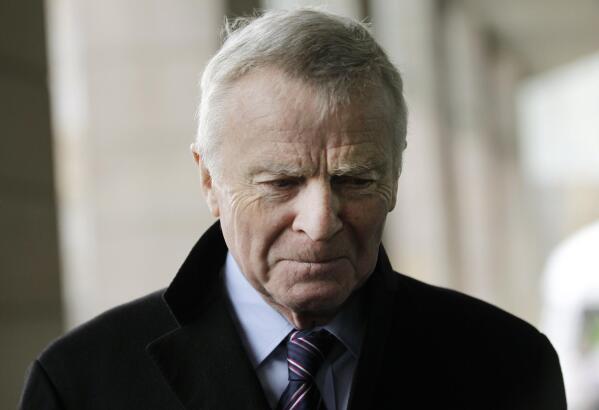 FILE - In this file photo dated Monday, Dec. 5, 2011, former Formula One chief Max Mosley arrives at a Select Committee hearing on privacy and injunctions, in London.  Former Formula One boss and privacy campaigner Max Mosley has died on Sunday May 23, aged 81, it is announced Monday May 24, 2021. (AP Photo/Sang Tan, FILE)