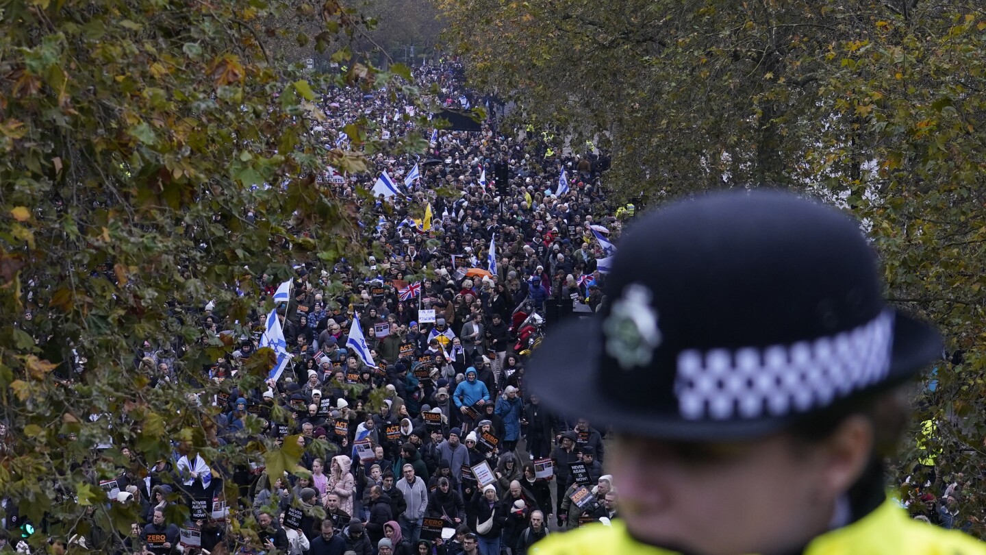 Former UK leader Boris Johnson joins thousands marching against antisemitism in London