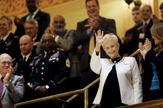 FILE - Sandra Deal waves as she is acknowledged by a round of applause before the State of the State address by her husband, Georgia Gov. Nathan Deal, on the House floor in Atlanta on Jan. 11, 2017. Sandra Deal died from brain cancer on Tuesday, Aug. 23, 2022, at age 80 at her home in Demorest, Ga. (AP Photo/David Goldman, File)