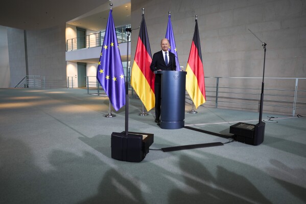 German Chancellor Olaf Scholz gives a statement at the chancellery in Berlin, Germany, Wednesday, Jan. 8, 2025. (AP Photo/Markus Schreiber)