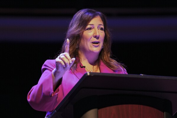 FILE - Sue Finkam, Republican candidate for Carmel mayor, speaks during a debate Monday, Oct. 2, 2023, at the Palladium in Carmel, Ind. Finkam won 56.6% of votes to defeat Democratic candidate and fellow city councilman Miles Nelson in Tuesday, Nov. 7 municipal election, according to unofficial returns from the Hamilton County election office. The election closed a contentious and at times bitter race to lead the city of about 102,000 people and succeed its longtime mayor.(Jenna Watson/The Indianapolis Star via AP, File)