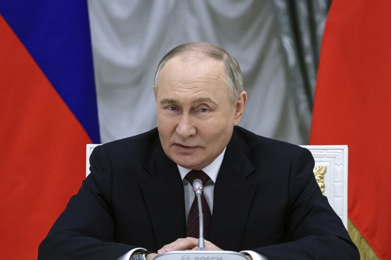 Russian President Vladimir Putin leads a meeting with the new cabinet members at the Kremlin in Moscow, Russia, Tuesday, May 14, 2024. (Vyacheslav Prokofyev, Sputnik, Kremlin Pool Photo via AP)