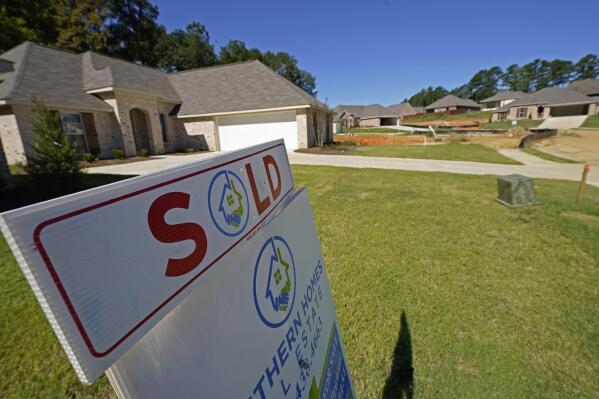 FILE - A "Sold" sign decorates the lawn of a new house in Pearl, Miss., Sept. 23, 2021. Homeowners are increasingly tapping their equity, taking advantage of big gains following years of soaring housing prices. Some 333,537 home equity loans were taken out by homeowners in the third quarter of 2022, according to data from TransUnion. (ĢӰԺ Photo/Rogelio V. Solis, File)
