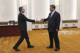 FILE - U.S. Secretary of State Antony Blinken meets with Chinese President Xi Jinping in the Great Hall of the People in Beijing, China, Monday, June 19, 2023. China on Wednesday, June 21, called comments by U.S. President Joe Biden referring to Chinese leader Xi Jinping as a dictator “extremely absurd and irresponsible.” (Leah Millis/Pool Photo via AP, File)