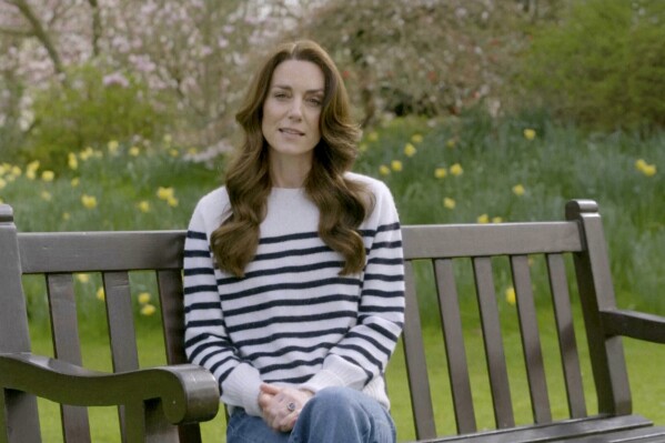 This grab taken from a video released by the BBC Studios on Friday March 22, 2024, shows Britain's Kate, the Princess of Wales recording her message announcing that following her abdominal surgery in January "tests after the operation found cancer had been present." Kate, said Friday she has cancer and is undergoing chemotherapy. (BBC Studios via AP)