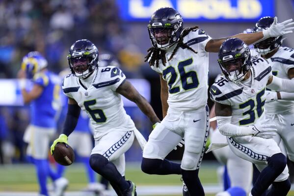 AFC wide receiver Stefon Diggs of the Buffalo Bills (14) and Dallas Cowboys Trevon  Diggs during the first half of the Pro Bowl NFL football game, Sunday, Feb.  6, 2022, in Las