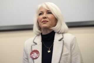 Candidate Tina Peters speaks during a debate for the state leadership position Saturday, Feb. 25, 2023, in Hudson, Colo. (AP Photo/David Zalubowski, File)