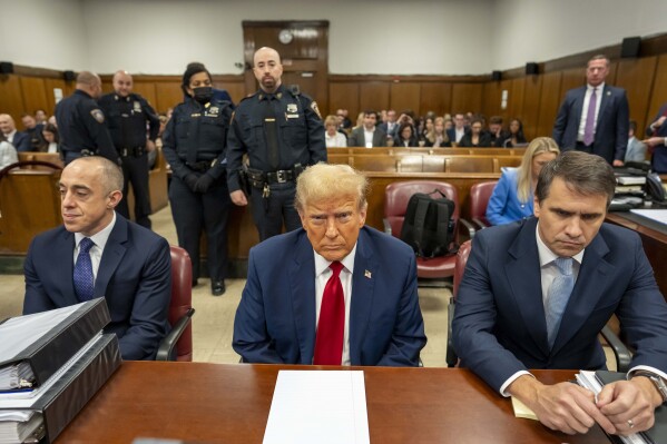Former President Donald Trump sits in the court room with his lawyers at Manhattan Criminal Court in New York, Thursday, April 25 2024. (Mark Peterson/Pool Photo via AP)