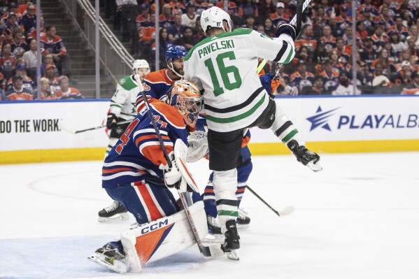 Dallas Stars' Joe Pavelski (16) screens Edmonton Oilers goalie Stuart Skinner during the first period of Game 6 of the Western Conference finals of the NHL Stanley Cup playoffs in Edmonton, Alberta, Sunday June 2, 2024. (Jason Franson/The Canadian Press via AP)