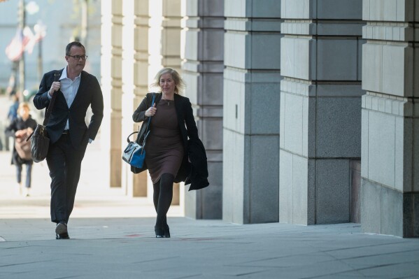 AP Senior Vice President and General Counsel Karen Kaiser, right, and AP Vice President and Associate General Counsel Brian Barrett arrive at the E. Barrett Prettyman Federal Courthouse for a hearing on The Associated Press' lawsuit against the Trump Administration to restore access to presidential events, Thursday, March 27, 2025, in Washington. (AP Photo/Kevin Wolf)