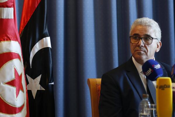 FILE - Libyan Interior Minister Fathi Bashagha speaks during a news conference in Tunis, Tunisia, Thursday, Dec. 26, 2019.  Libya's East-based lawmakers named Thursday, Feb. 10, 2022, Bashagha to replace Abdul Hamid Dbeibah as head of a new interim government, according to the parliament spokesman, Abdullah Bliheg. (AP Photo/Hassene Dridi)