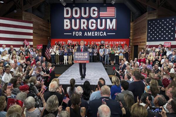 North Dakota Gov. Doug Burgum speaks as he kicks off his campaign for the 2024 Republican presidential nomination, Wednesday, June 7, 2023 in Fargo, N.D. Burgum, 66, joins a long list of contenders hoping to dent former President Donald Trump’s early lead in the race. The governor of the nation's fourth-least populous state announced his candidacy in The Wall Street Journal. (AP Photo/Mark Vancleave)