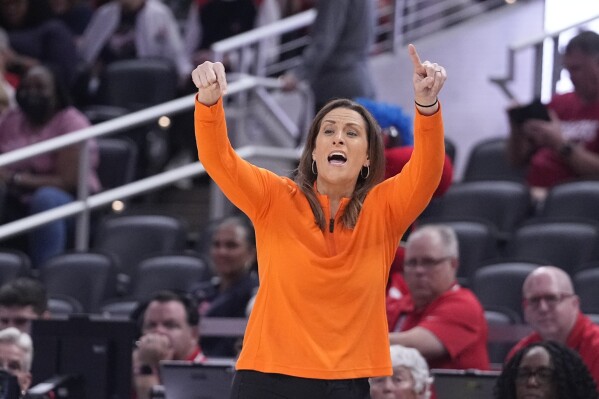 FILE - Connecticut Sun head coach Stephanie White calls a play during the first half of a WNBA basketball game against the Indiana Fever, Friday, May 19, 2023, in Indianapolis. White was named The Associated Press WNBA Coach of the Year, Tuesday, Sept. 12, 2023. (AP Photo/Darron Cummings, File)