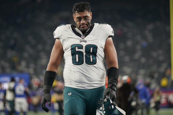 FILE - Philadelphia Eagles offensive tackle Jordan Mailata (68) after an NFL football game against the New York Giants, on Jan. 8, 2024, in East Rutherford, N.J. The NFL will expand its international search for talent by opening an academy in rugby-mad Australia to develop promising teenagers in the Asia-Pacific region into college and pro prospects. The NFL Academy will open in September for student athletes ages 12 to 18, following recruitment camps taking place this summer in Australia and New Zealand. Ahead with the NFL Draft, the announcement says the region is full of talent the likes of Philadelphia Eagles offensive tackle Jordan Mailata, a 6-foot-8 Australian who was deemed too big for rugby. (AP Photo/Bryan Woolston, File)
