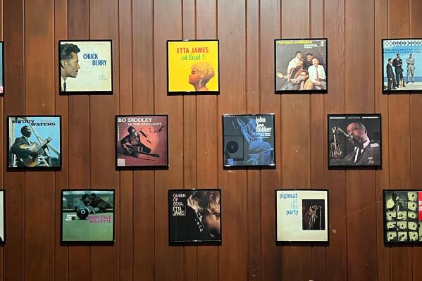 Framed album covers appear on the wall at Chess Records in Chicago on Feb. 27, 2022. Some of the biggest names in blues recorded hits in Chess' recording studio, including, Muddy Waters, Chuck Berry' and Bo Diddley. (Kim Curtis via AP)
