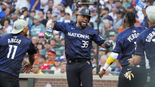Colorado Rockies' Elias Diaz celebrates after hitting a two-run home run in the All-Star Game, Tuesday, July 11, 2023.  (AP Photo/Ted S. Warren)