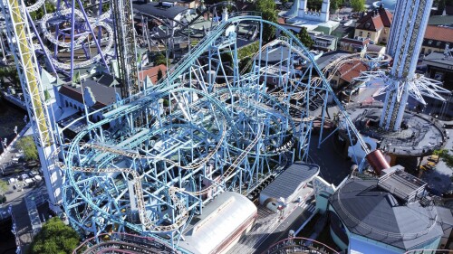 An aerial photo of the Jetline roller coaster at Gröna Lund amusement park in Stockholm, Sweden, on Monday, June 26, 2023. Swedish government investigators on Monday launched an investigation into a roller coaster accident that killed one person and injured nine at the country's oldest amusement park.  Gröna Lund park has been closed, and will remain closed for at least one week after the accident occurred on Sunday 25 June 2023, when the roller coaster train partially derailed, sending some passengers to the ground.  (Marko Saavala/TT News Agency via AP)