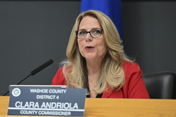 Clara Andriola, Washoe County Commissioner District 4, speaks during a county commission meeting in Reno, Nev. on Tuesday June 4, 2024. The county commission meetings in Washoe County have become a hotbed for election conspiracies since 2020 as wealthy far-right activist Robert Beadles has attempted to wield his power to replace lawmakers who don't parrot his talking points, including election conspiracies. If Andriola is unseated, then it is possible that three of the five commissioners in the swing county will be backed by the election fraud crusader. (AP Photo/Andy Barron)
