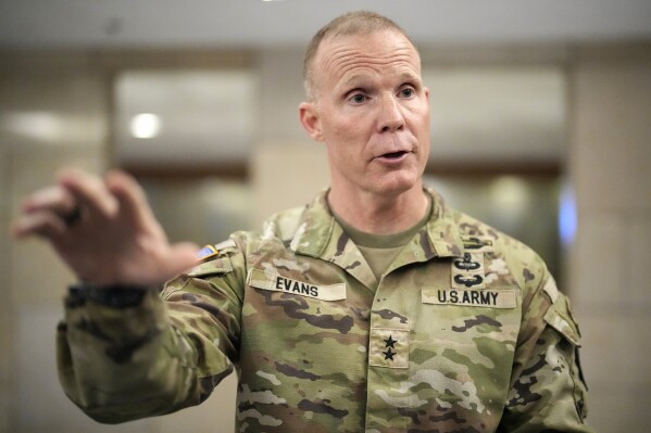 Maj. Gen. Marcus Evans, Commanding General of the U.S. Army's 25th Infantry Division, gestures during an interview with The Associated Press on Thursday, Feb. 8, 2024, in Manila, Philippines. Combat-readiness exercises between the U.S. and Philippine military, which involve thousands of forces each year, would not be affected by America’s focus on the wars in Ukraine and the Middle East, Evans said Thursday. (AP Photo/Aaron Favila)