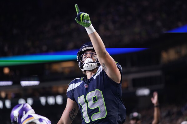 Seattle Seahawks wide receiver Jake Bobo celebrates after scoring against the Minnesota Vikings during the second half of an NFL preseason football game in Seattle, Thursday, Aug. 10, 2023. (AP Photo/Lindsey Wasson)