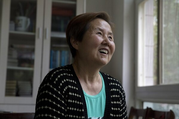 
              In this photo taken Sunday, June 3, 2018, Xu Shijuan, a 63-year-old Seventh-Day Adventist talks about her faith at her home in Zhengzhou in central China's Henan province. Under President Xi Jinping, China's most powerful leader since Mao Zedong, believers are seeing their freedoms shrink dramatically even as the country undergoes a religious revival. For four years, Xu used her living room for house church gatherings. She stopped in March after a group of men led by a local official ordered her to disband the meeting of about two dozen elderly Christians. (AP Photo/Ng Han Guan)
            