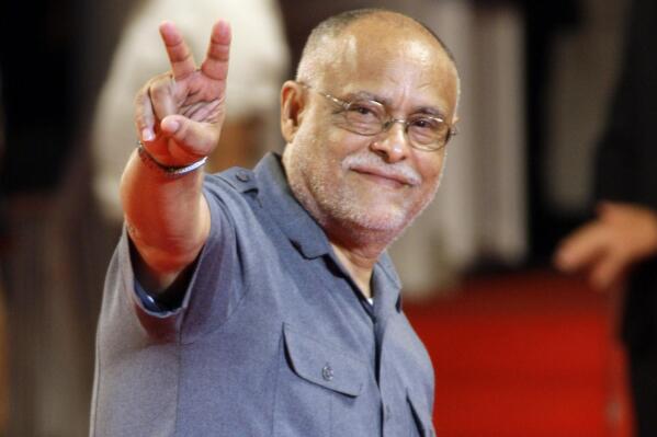 FILE - Director Haile Gerima arrives for a screening at the 65th edition of the Venice Film Festival in Venice, Italy, on Sept. 2, 2008. The 75-year-old LA Rebellion filmmaker is getting renewed attention with a restoration of his 1993 film "Sankofa" and an honor from the new Academy Museum. (AP Photo/Andrew Medichini, File)