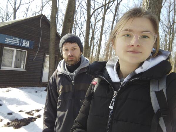 This March 2022 photo provided by Alona Shulenko shows her, right, and fellow zoologist Anton Vlaschenko outside the Feldman Ecopark area outpost of the Ukrainian Bat Rehabilitation Center in Kharkiv, Ukraine. “Our staying in Ukraine, our continuing to work – it’s some kind of resistance of Russian invasion,” Vlaschenko said via Zoom, a barrage of shelling audible in the background. “The people together in Ukraine are ready to fight, not only with guns. We don’t want to lose our country.” (Alona Shulenko via AP)