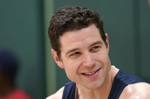 Jimmer Fredette speaks during an interview after practice for the USA Basketball 3x3 national team, Monday, Oct. 31, 2022, in Miami Lakes, Fla. (AP Photo/Lynne Sladky)
