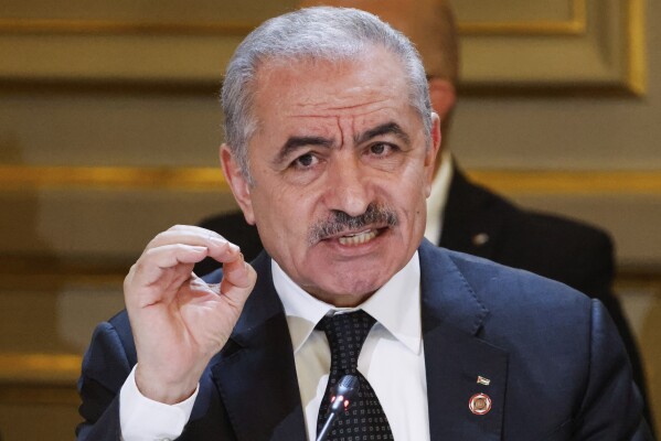 FILE - Palestinian Prime Minister Mohammed Shtayyeh speaks during a meeting with officials from Western and Arab nations, the United Nations and nongovernmental organizations at the Elysee Palace, in Paris, Thursday, Nov. 9, 2023. Prime Minister Shtayyeh says his government is resigning, in a move that could open the door to U.S.-backed reforms in the Palestinian Authority. (Ludovic Marin/Pool Photo via AP, File)