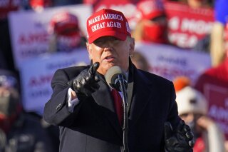 President Donald Trump gestures while addressing a campaign rally at the Wilkes-Barre Scranton International Airport in Avoca, Pa, Monday, Nov. 2, 2020. (AP Photo/Gene J. Puskar)
