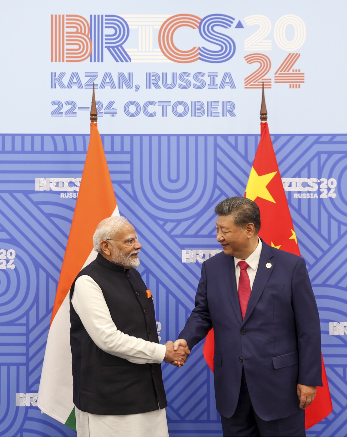 India's Modi and Chinese President Xi meet days after a border accord between the countries